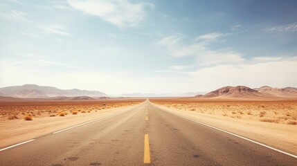 Fototapeta premium Empty asphalt road in the desert. Long straight asphalt road leading to the desert