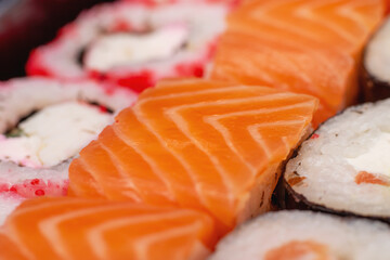 Bright beautiful rolls with fish close up