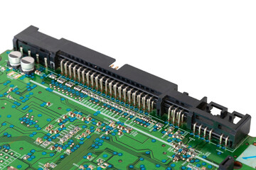CD-ROM drive motherboard with green print and chip, close-up