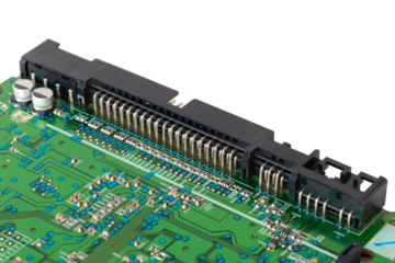 CD-ROM drive motherboard with green print and chip, close-up