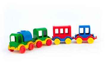 Children's toy, a multi-colored steam locomotive on a white background.