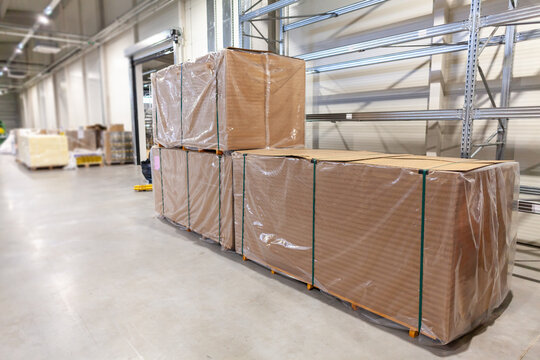 Pallets of Packaged Goods Ready for Shipment in Distribution Warehouse