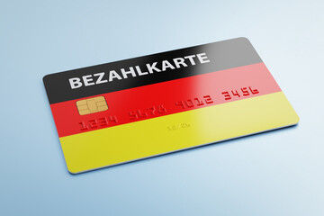 A debit card with the German flag and the label "Bezahlkarte" (payment card) with fake number lying on a blue table. Germany is changing support payments to asylum seekers from cash to debit card