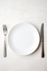 table setting. plate fork knife white empty