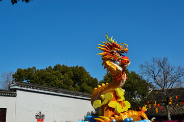 Chinese dragon lanterns under the blue sky during the Spring Festival