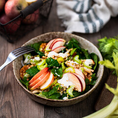 Traditional Waldorf salad on a wooden background, top view