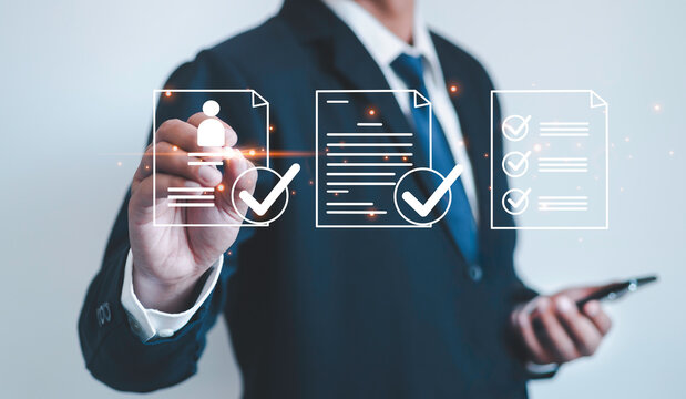 Businessman filling out employee evaluation form online Human resource management (HR), human resource management concepts, HR, recruiting, leadership and team building