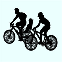 silhouette of a couple riding a bicycle