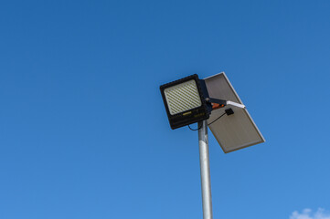 solar-powered street lighting floodlight against the sky 2