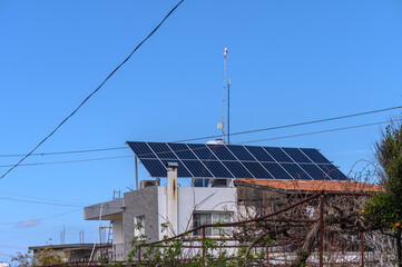 solar panels on the roof of a house in the village 3