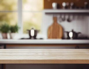 Empty tabletop over defocused kitchen with copy space