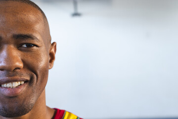 Close-up of an African American man smiling, with copy space