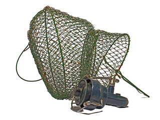 Vintage fishing trap with reel on white background
