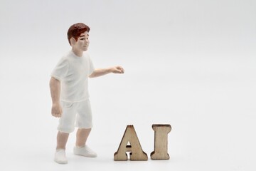 miniature figurine of people with artificial intelligence abbreviation