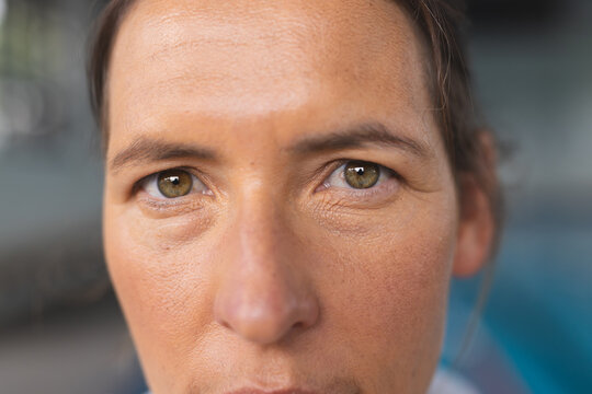 Close-up of a Caucasian woman's face, with copy space