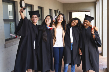 Diverse group of graduates celebrate their achievement