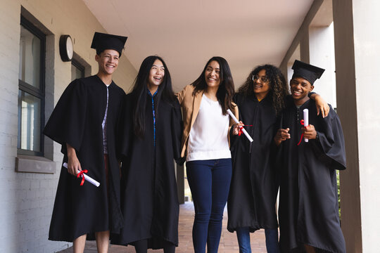 Diverse group of graduates celebrate their achievement