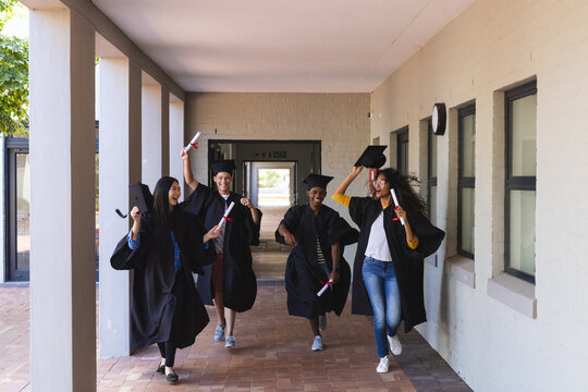 Diverse students celebrate graduation at high school