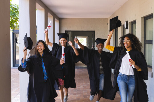 Diverse students celebrate graduation at high school