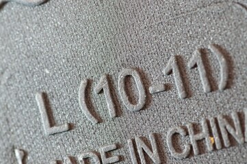 Sole of shoe with size and country of origin