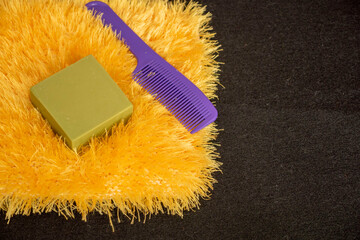 hand-knitted bath loofah in yellow color and pattern,