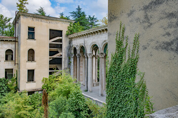 Nature's Takeover: Derelict Sanatorium and Abandoned Buildings with Shattered Windows and Doors