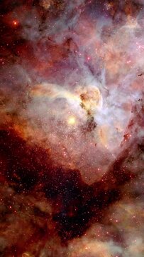 Space background, colorful nebula in deep space rotating with flying stars. Based on image by Nasa. Vertical video