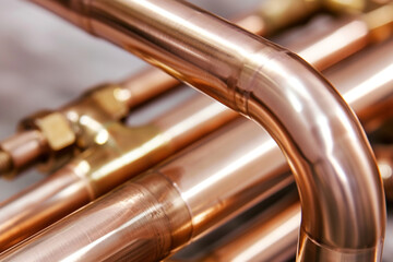 Group, set of simple new high quality shiny copper tubing copper plumbing heating system pipes, fixing pipes and fittings for connection of water or gas systems. Сloseup. HVAC service. Banner - obrazy, fototapety, plakaty