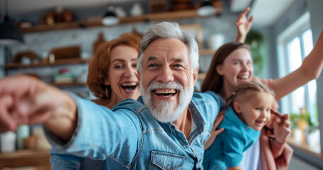 Cheerful multi-generation family having fun while spending time together at home 
