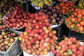 Rambutan fruits on sale at the market in Hue, Vietnam