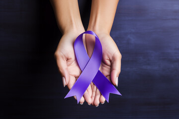 Eating disorders concept: woman hands with a purple ribbon, as a symbol of awareness of anorexia 