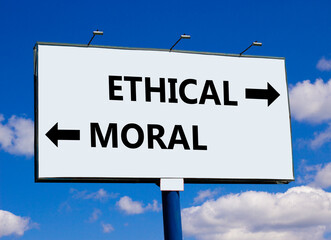 Ethical or moral symbol. Concept word Ethical or Moral on beautiful billboard with two arrows....