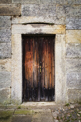 Simple wooden door in the castle
