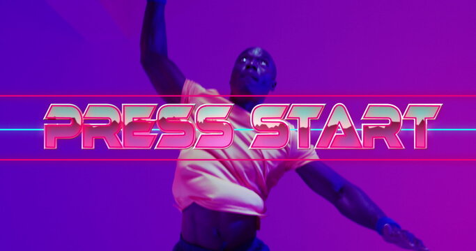 Image of press start text over neon pattern and african american basketball player