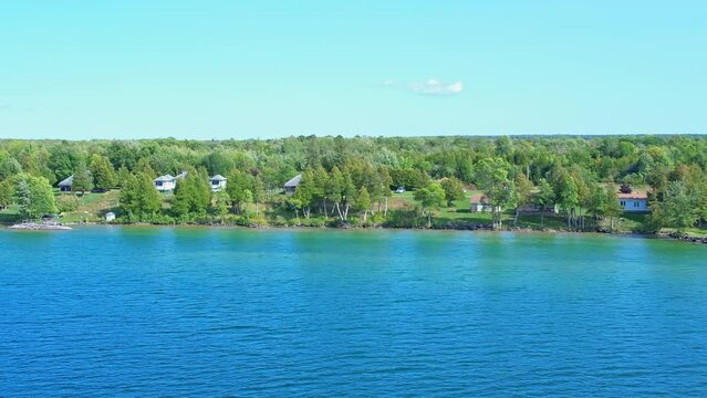 Luxury day vacation aerial view, surrounded by the natural beauty of Lake Manitou. Haven allure of recreational bliss, panoramic views of shoreline of Manitoulin Island, aquatic adventures in paradise