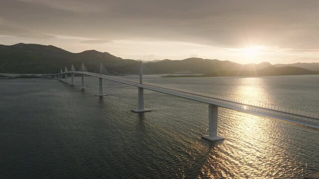 Modern bridge crossing the blue sea, connecting islands in the Mediterranean country. Aerial view.