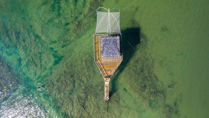 Pêcherie, aerial view of fishing hut on the jade coast, St.Michel Chef Chef