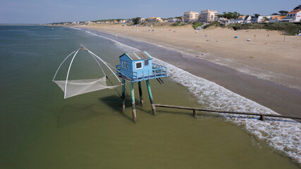 Aerial view of blue fishing hut in Saint Michel Chef Chef
