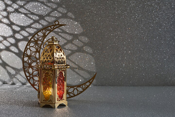Ramadan Kareem. golden moon and lantern on glowing background for Holy month Ramadan celebration