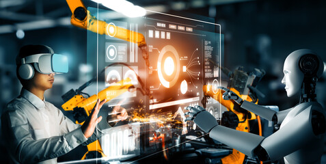 XAI Mechanized industry robot and human worker working together in future factory. Concept of artificial intelligence for industrial revolution and automation manufacturing process. - obrazy, fototapety, plakaty