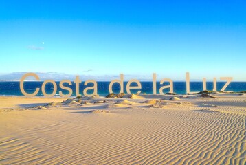 Costa de la Luz Lettering in the wonderful dune landscape at the Atlantic Ocean near Tarifa, Costa...
