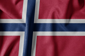 National Flag on Textured Fabric Background. Silk textured flag, realistic wave and flag look. NO  Flag of Norway