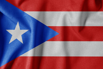 National Flag on Textured Fabric Background. Silk textured flag, realistic wave and flag look. PR  Flag of Puerto Rico