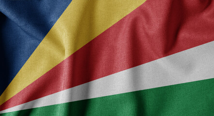 National Flag on Textured Fabric Background. Silk textured flag, realistic wave and flag look. SC  Flag of Seychelles