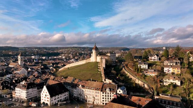 Aerial drone footage of the Schaffhausen old town by the Rhine river in eastern Switzerland