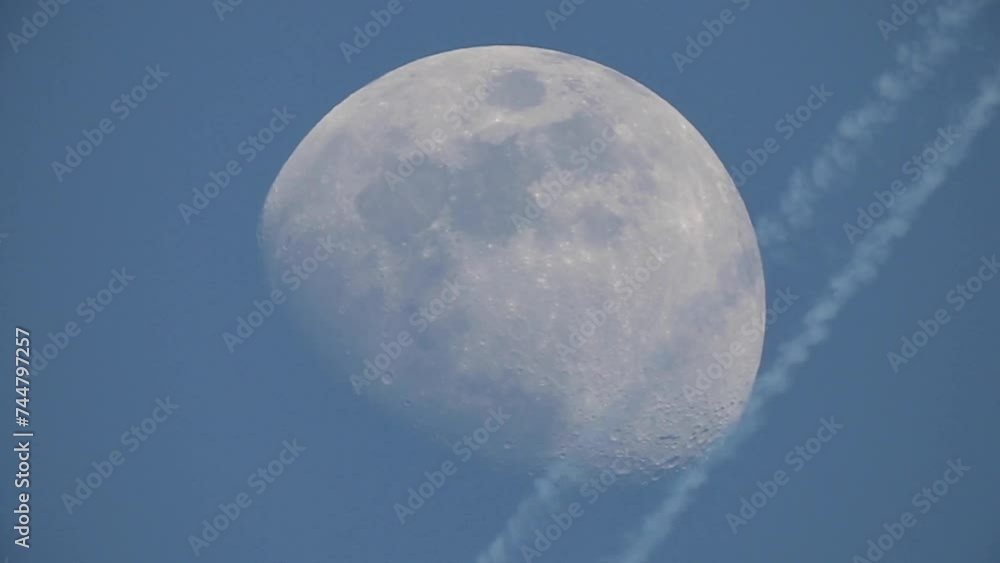 Canvas Prints video of the moon in which you can see the craters. a plane passes in front of the moon at that prec