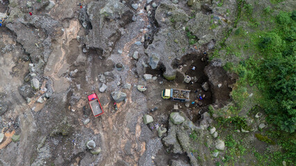 aerial view of sand and stone mining on the slopes of Mount Merapi in Sleman Regency, Yogyakarta