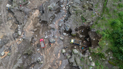 aerial view of sand and stone mining on the slopes of Mount Merapi in Sleman Regency, Yogyakarta