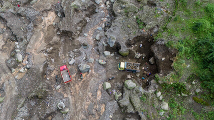 aerial view of sand and stone mining on the slopes of Mount Merapi in Sleman Regency, Yogyakarta
