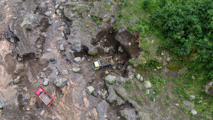 aerial view of sand and stone mining on the slopes of Mount Merapi in Sleman Regency, Yogyakarta